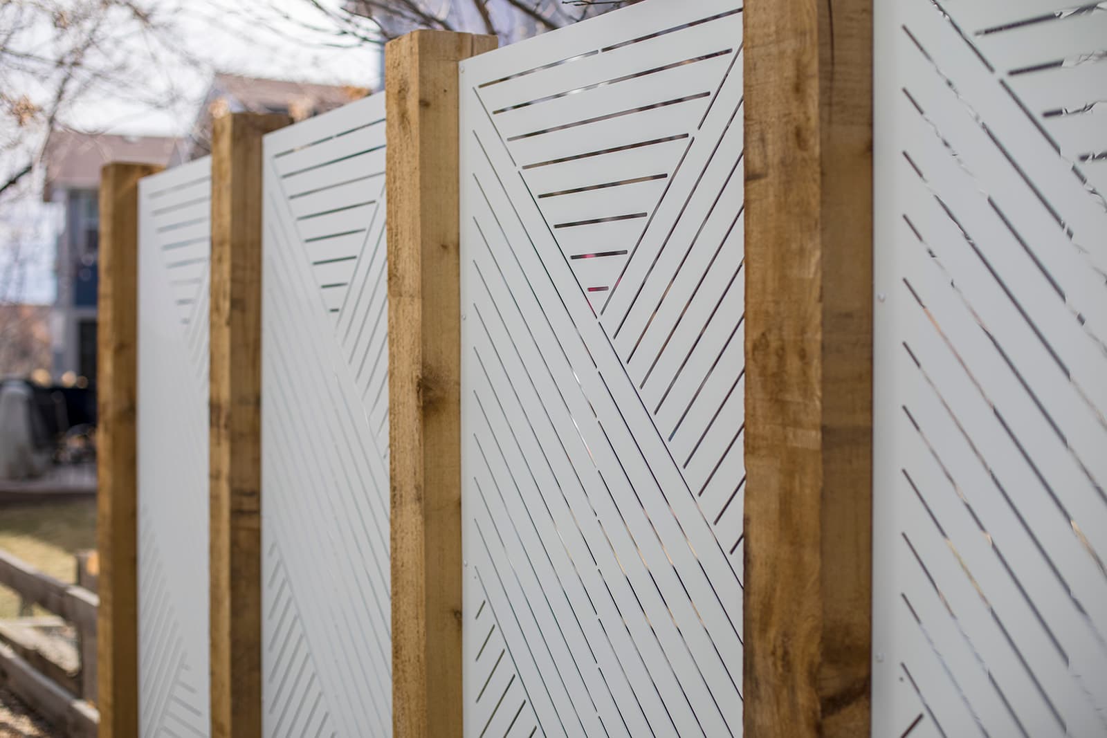 Tiered natural stone retaining wall and landscape design in Boulder, Colorado
